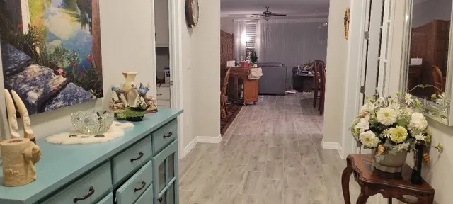 a bathroom with a sink mirror and vanity