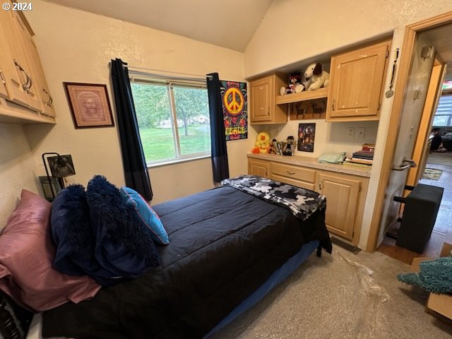 28800 Salmon River Highway Grand Ronde, OR 97347 - Photo 15 of 37 a bed sitting in a bedroom next to a window