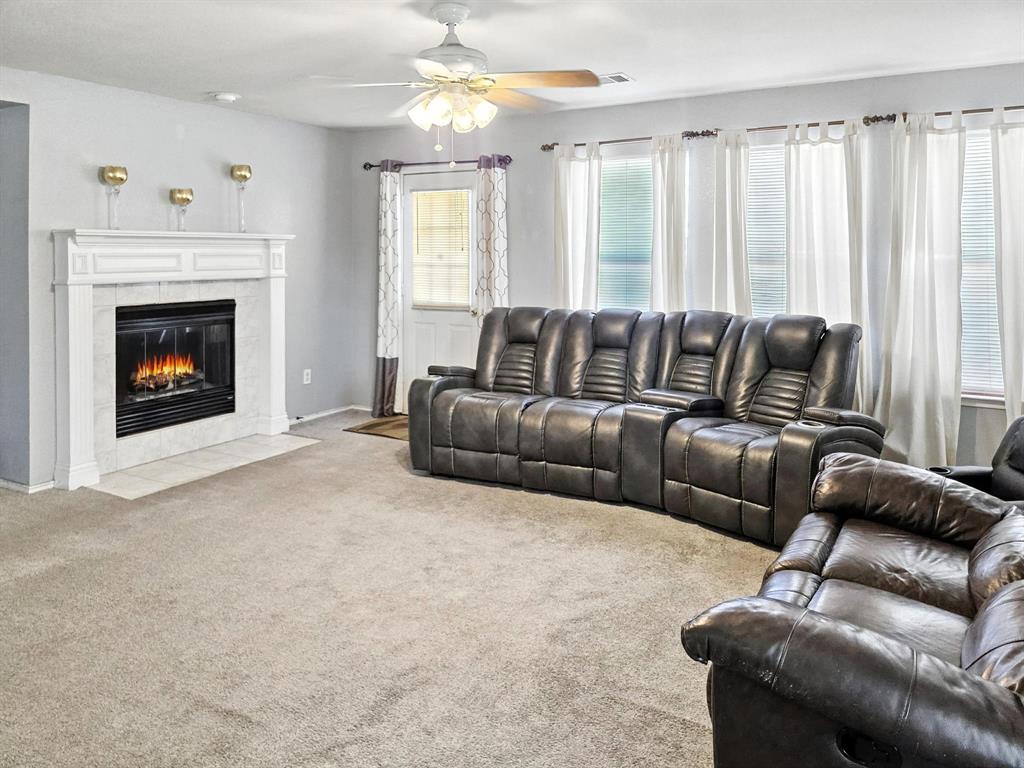 1330 White Tail Ridge Cedar Hill, TX 75104 - Photo 12 of 17 a living room with furniture and a fireplace