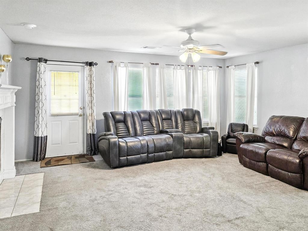 1330 White Tail Ridge Cedar Hill, TX 75104 - Photo 13 of 17 a living room with furniture and a large window
