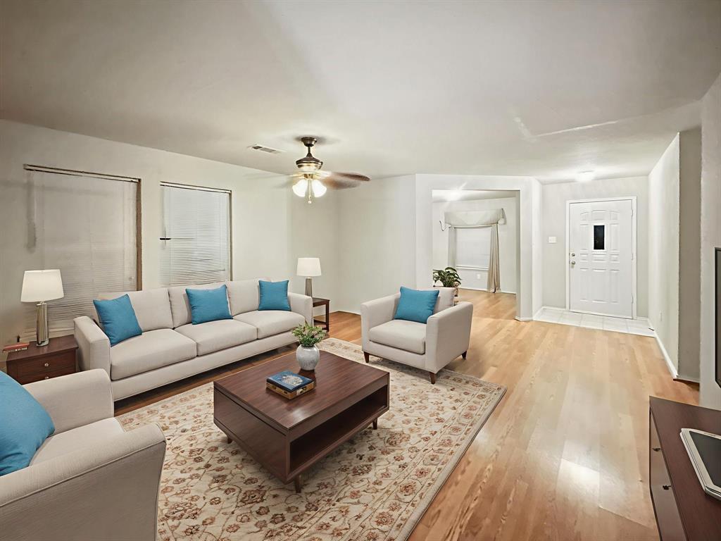 1330 White Tail Ridge Cedar Hill, TX 75104 - Photo 2 of 17 a living room with furniture and a wooden floor