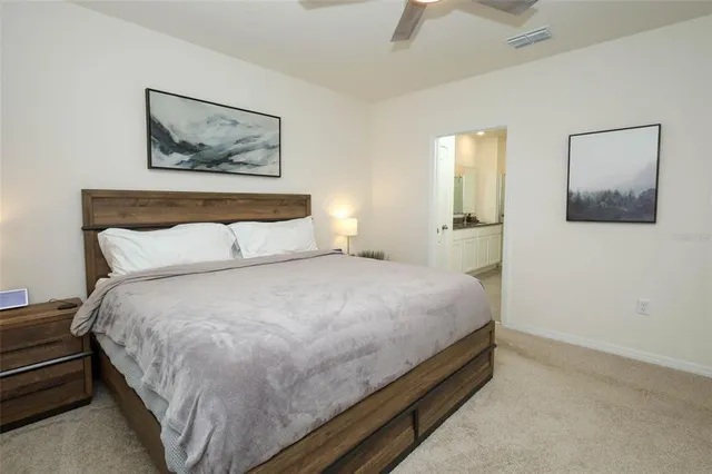 a bathroom with a granite countertop sink double and mirror