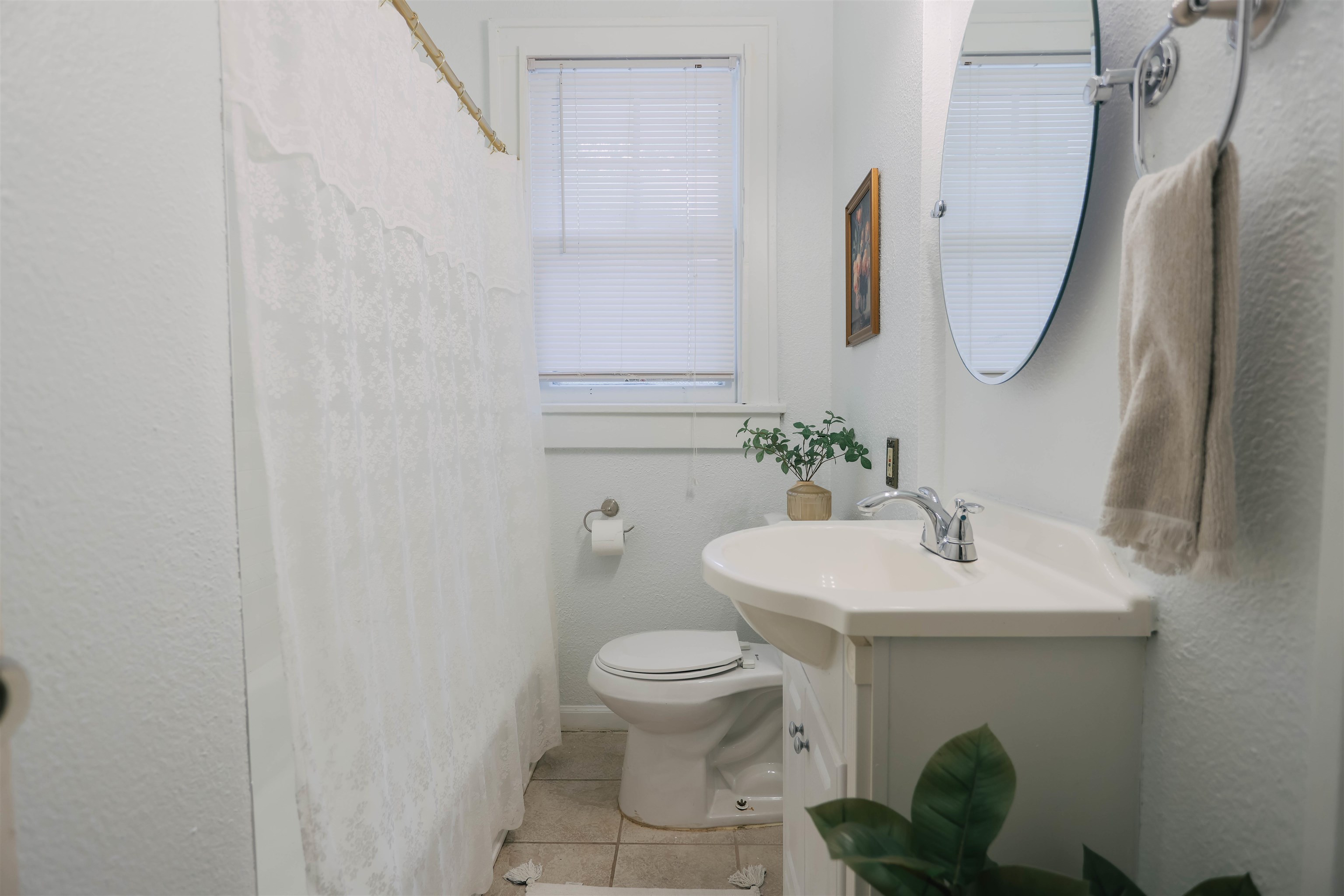 401 Alexander Street Memphis, TN 38111 - Photo 17 of 21 a bathroom with a toilet and a sink