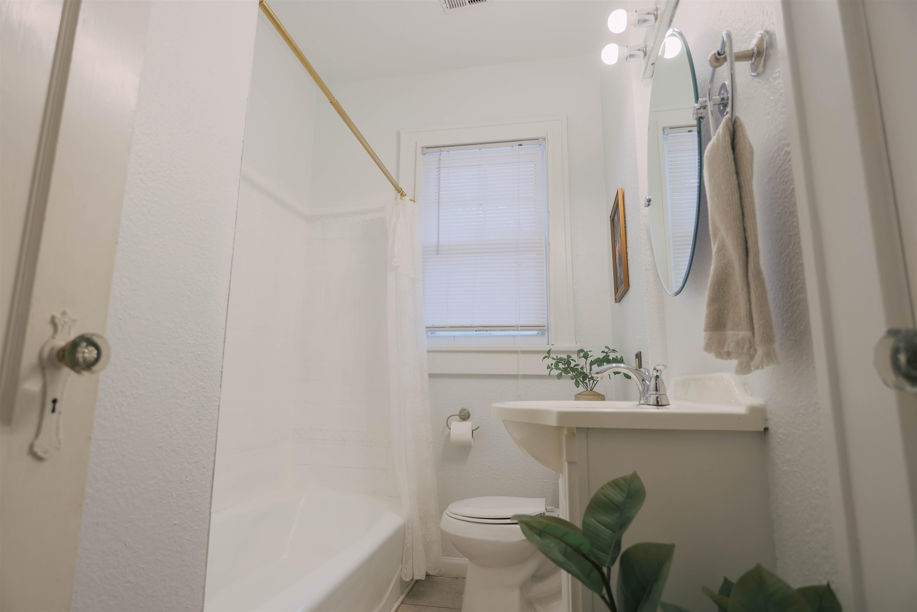 401 Alexander Street Memphis, TN 38111 - Photo 18 of 21 a bathroom with a sink mirror vanity and toilet