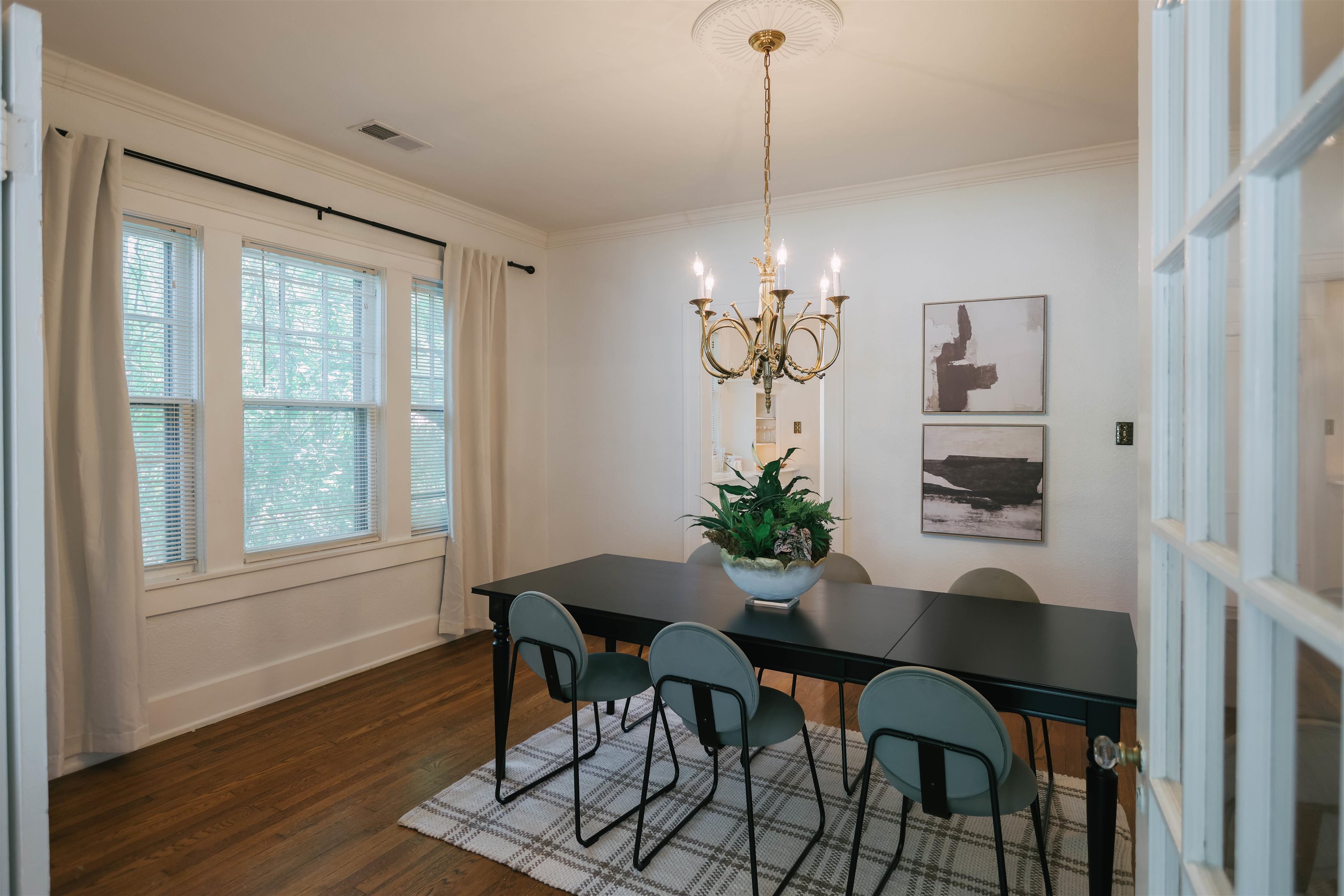 401 Alexander Street Memphis, TN 38111 - Photo 8 of 21 a view of a dining room with furniture wooden floor and chandelier