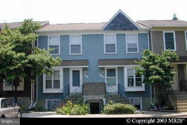 3810 9th Road South, Unit 3810 Arlington, VA 22204 - Photo 1 of 1 a front view of a house with trees