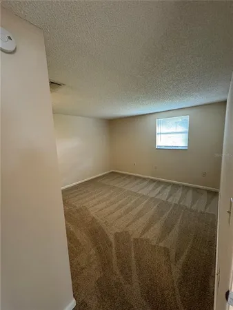 a view of empty room with window