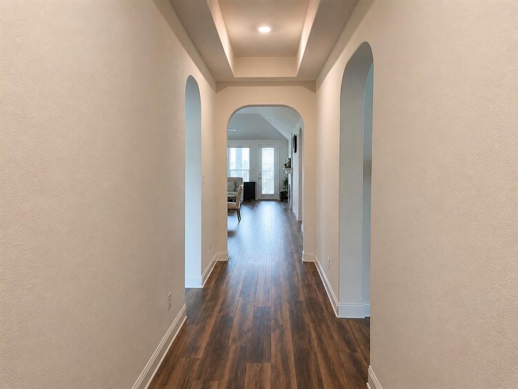 3598 Furrow Road Frisco, TX 75035 - Photo 2 of 14 a view of a hallway with wooden floor