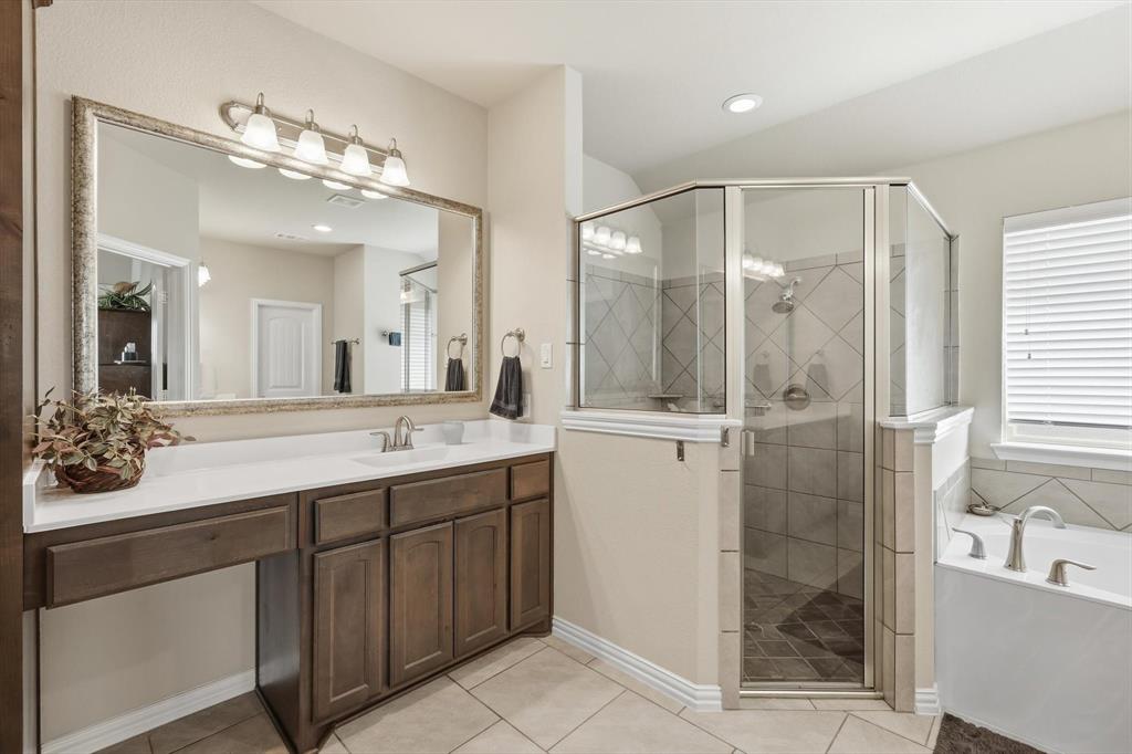 113 Heather Lane Decatur, TX 76234 - Photo 18 of 32 a bathroom with a double vanity sink mirror and shower