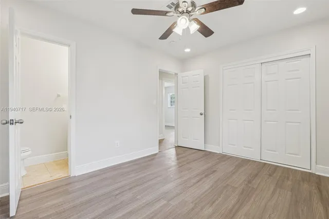 a bathroom with a sink and vanity