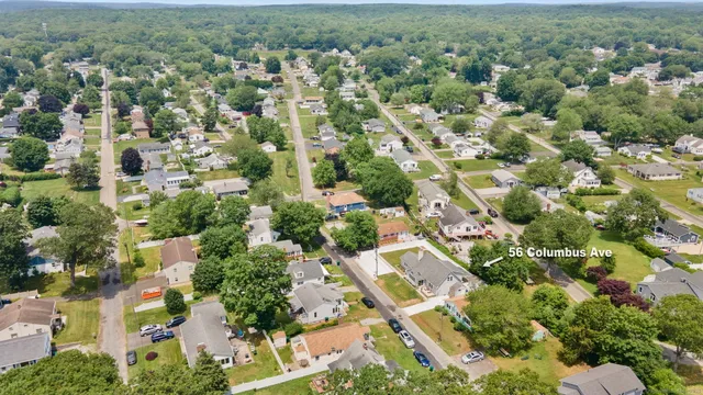 a kitchen with a stove a sink and a refrigerator