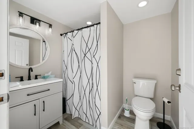 a kitchen with cabinets and white appliances