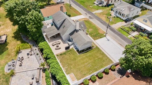 an aerial view of house with a swimming pool
