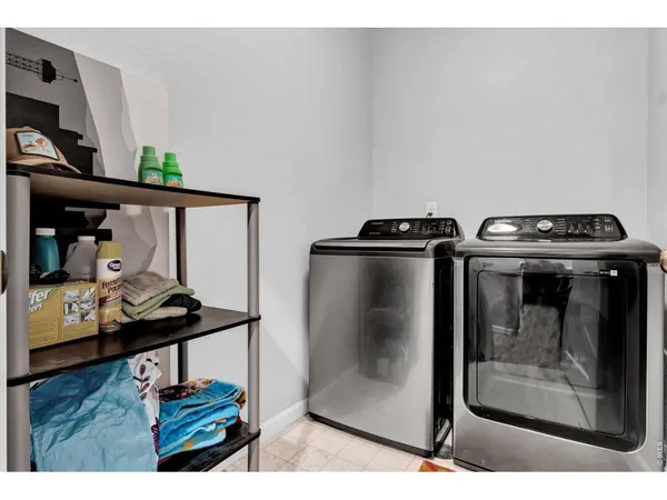 a utility room with washer and dryer
