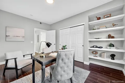 a view of a workspace with furniture