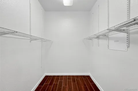 a view of a room with racks on the wall