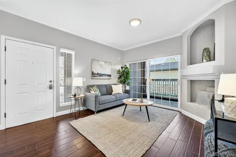 a living room with furniture and a table