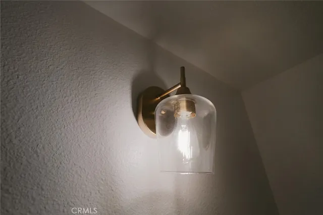 a room with a bed and a window