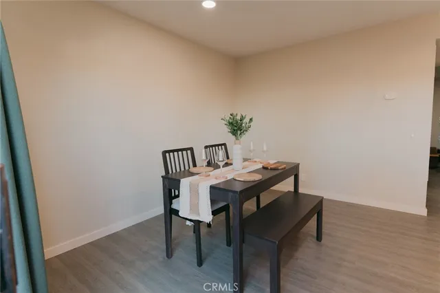 a couple of flower plants in front of door