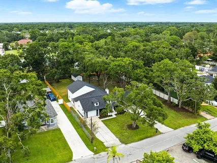 an aerial view of a house with a garden