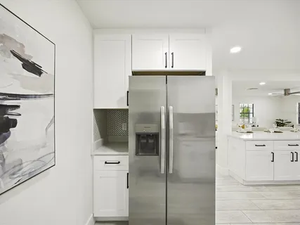 a bed room with a bed and a window