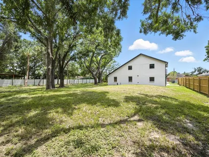 a view of outdoor space with trees all around
