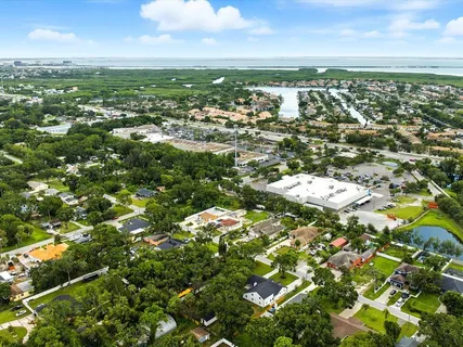 an aerial view of a house with a garden