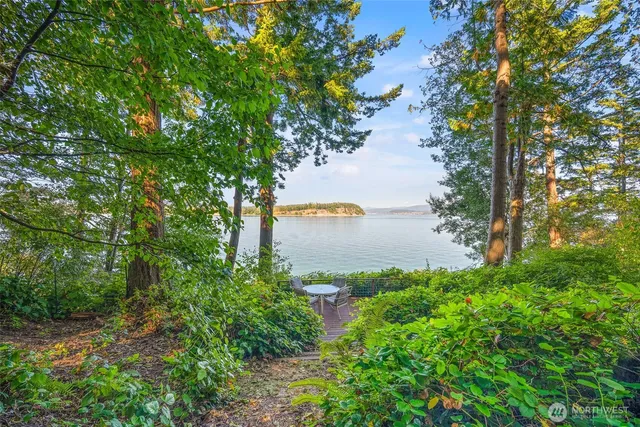 a view of a lake with a table and a table
