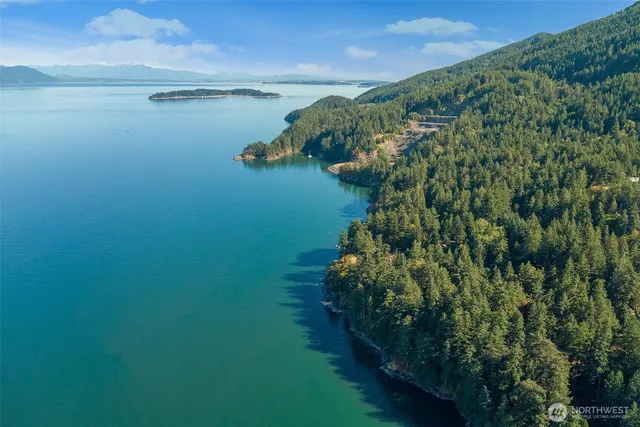 a view of a lake with a yard