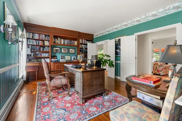 a room with furniture and a rug