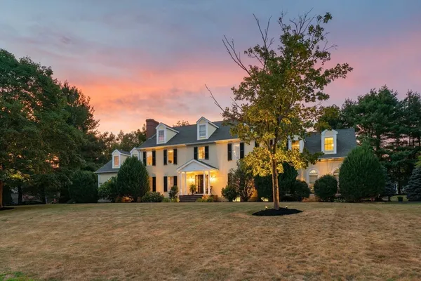 front view of a house with a street