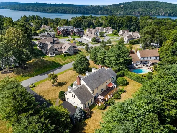 an aerial view of a house with a garden