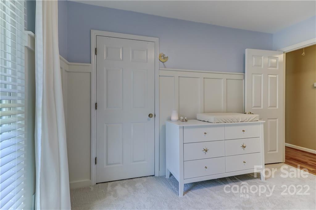 6023 Lanai Lane Tega Cay, SC 29708 - Photo 29 of 43 a room with a cabinets and dresser