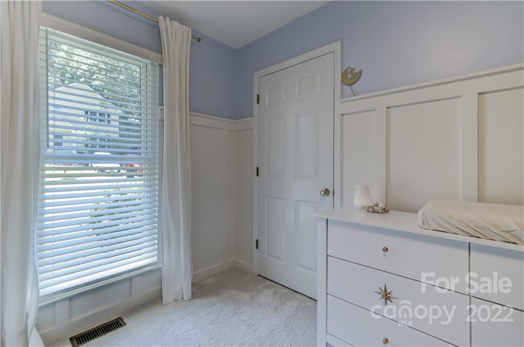 6023 Lanai Lane Tega Cay, SC 29708 - Photo 30 of 43 a bathroom with a sink and a mirror