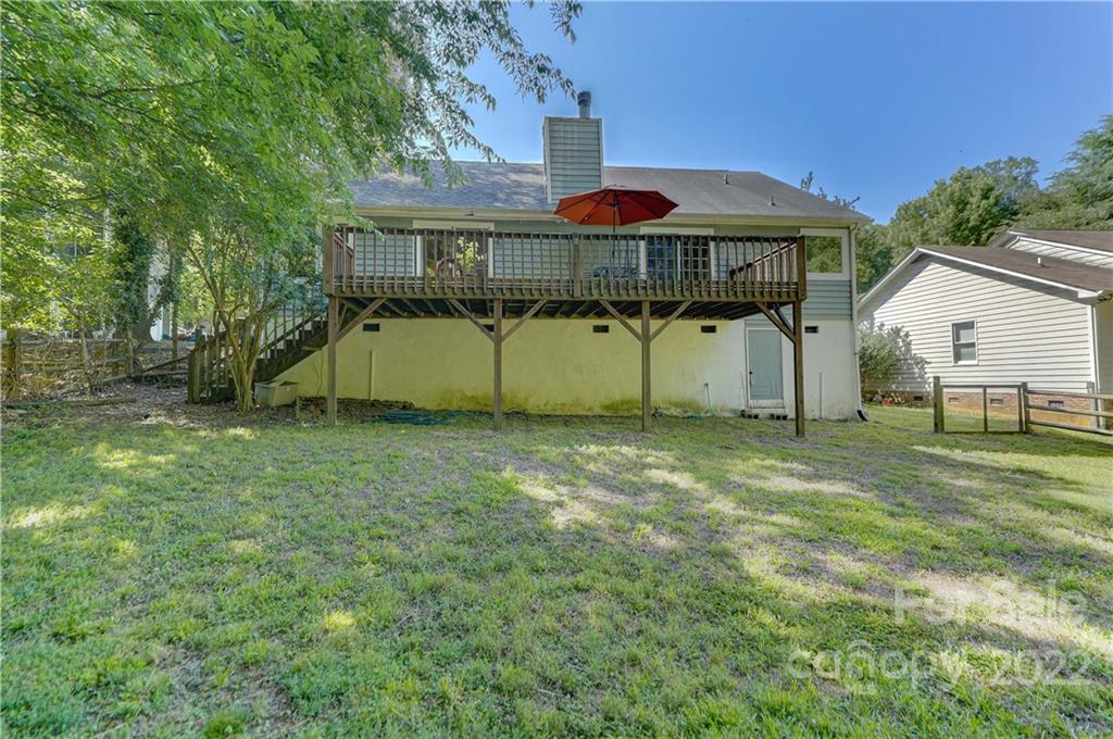 6023 Lanai Lane Tega Cay, SC 29708 - Photo 38 of 43 a front view of a house with a garden