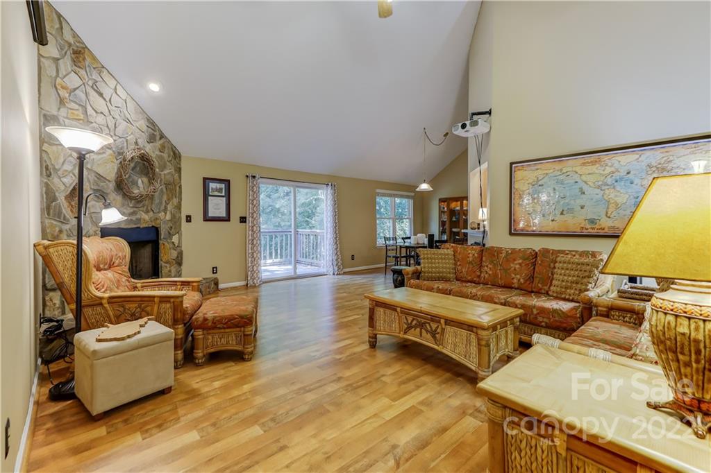 6023 Lanai Lane Tega Cay, SC 29708 - Photo 4 of 43 a living room with furniture and a lamp