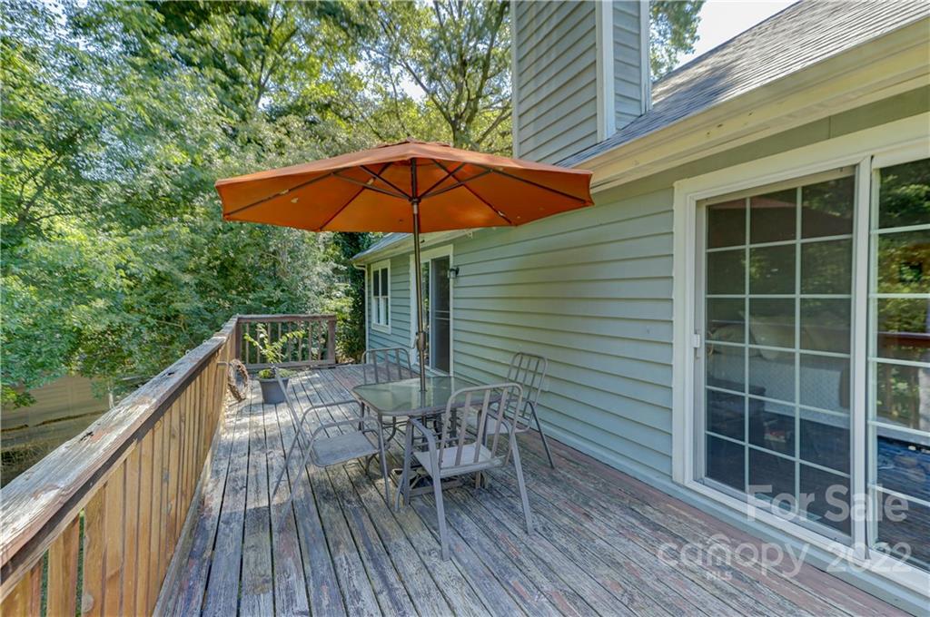 6023 Lanai Lane Tega Cay, SC 29708 - Photo 42 of 43 a view of house with deck and outdoor seating