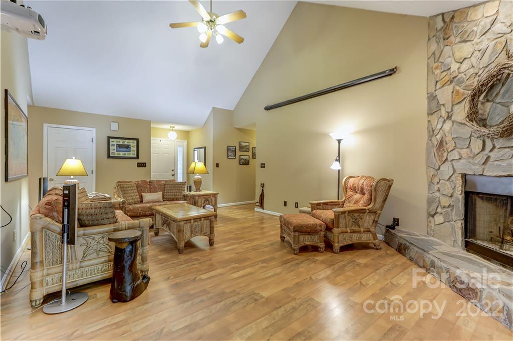 6023 Lanai Lane Tega Cay, SC 29708 - Photo 7 of 43 a living room with fireplace furniture and a fireplace