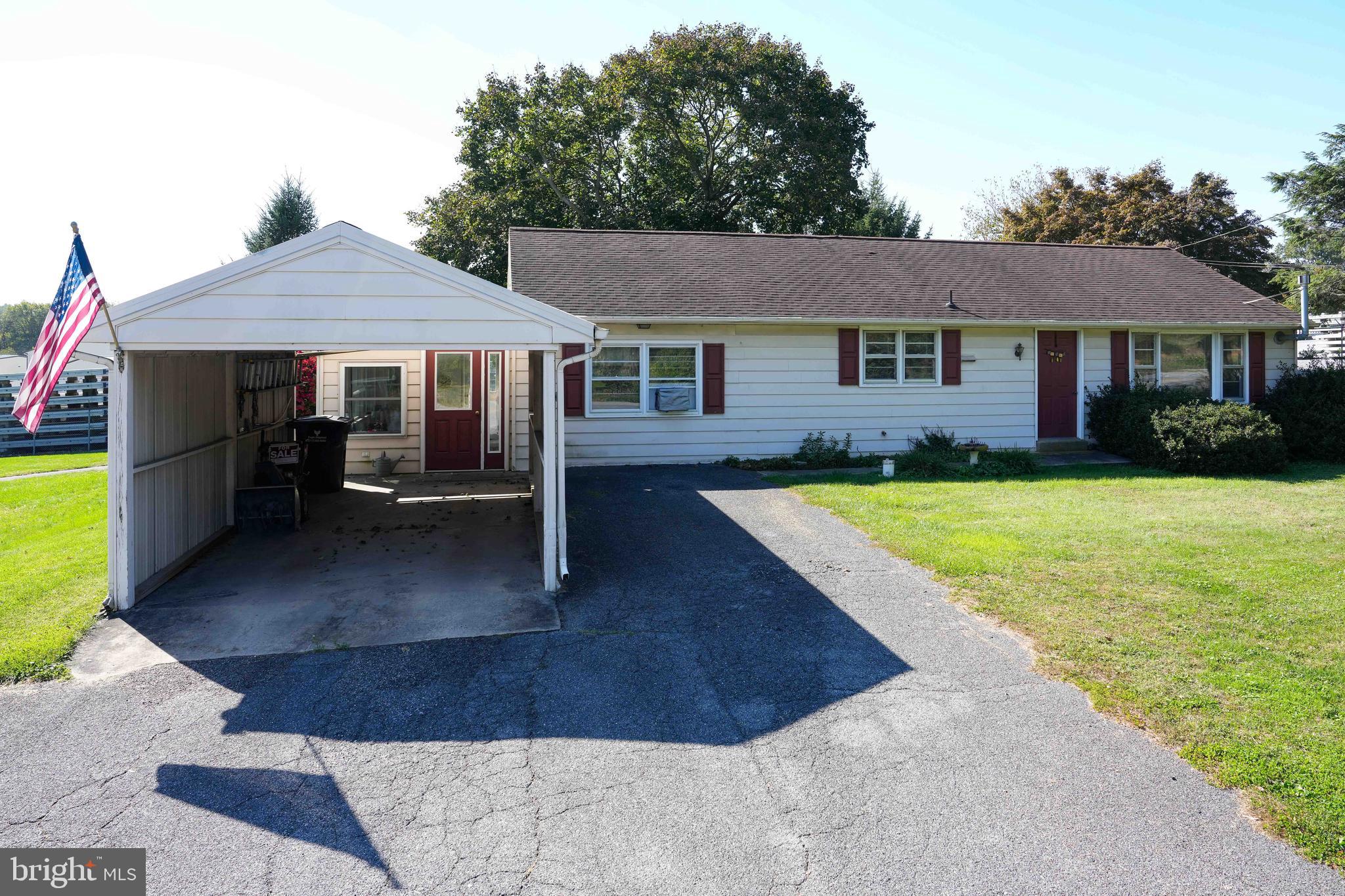 Well-kept 2 BR w/carport to keep the car snow-free