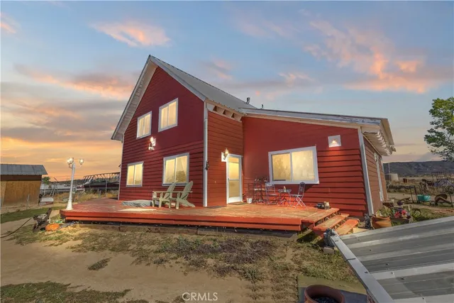 a view of a building with sitting area