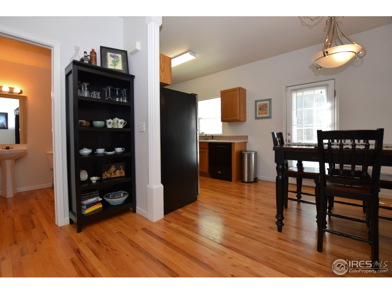 6612 Avondale Road, Unit D Fort Collins, CO 80525 - Photo 7 of 28 Dining to Kitchen
