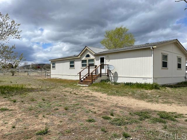 465-855 Cook Road Janesville, CA 96114 - Photo 1 of 1 a view of a house with a yard