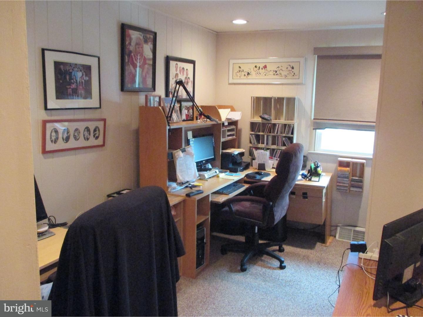 641 Kismet Road Philadelphia, PA 19115 - Photo 18 of 25 a view of a workspace with furniture and a window