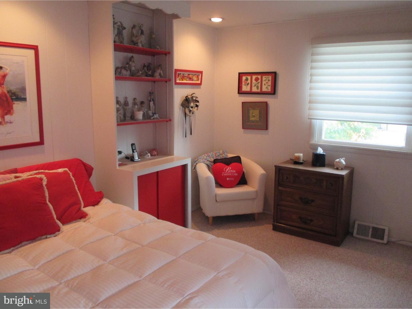 641 Kismet Road Philadelphia, PA 19115 - Photo 20 of 25 a bedroom with a bed and a window