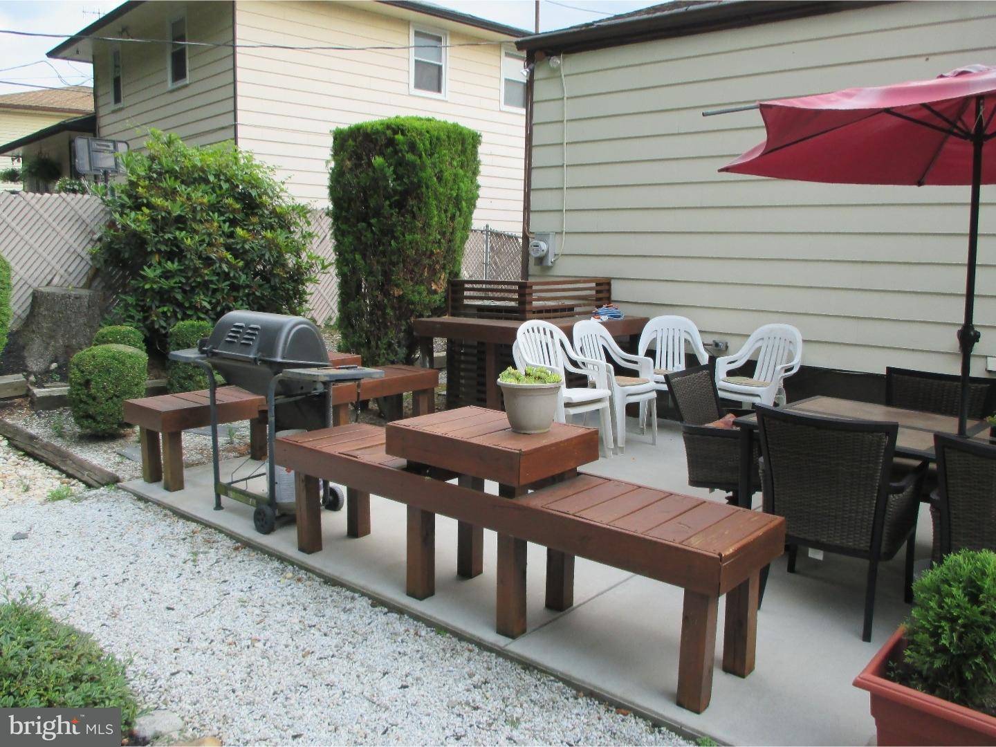 641 Kismet Road Philadelphia, PA 19115 - Photo 6 of 25 a view of a dinning table and chairs in the patio