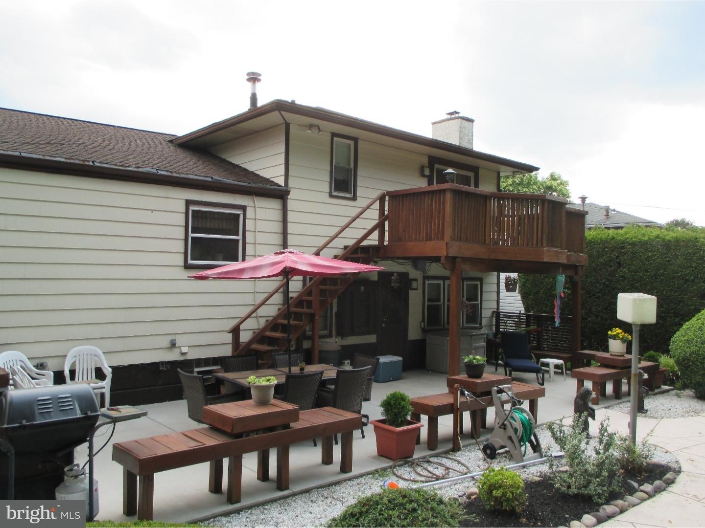 641 Kismet Road Philadelphia, PA 19115 - Photo 7 of 25 a front view of house with yard outdoor seating and outdoor seating