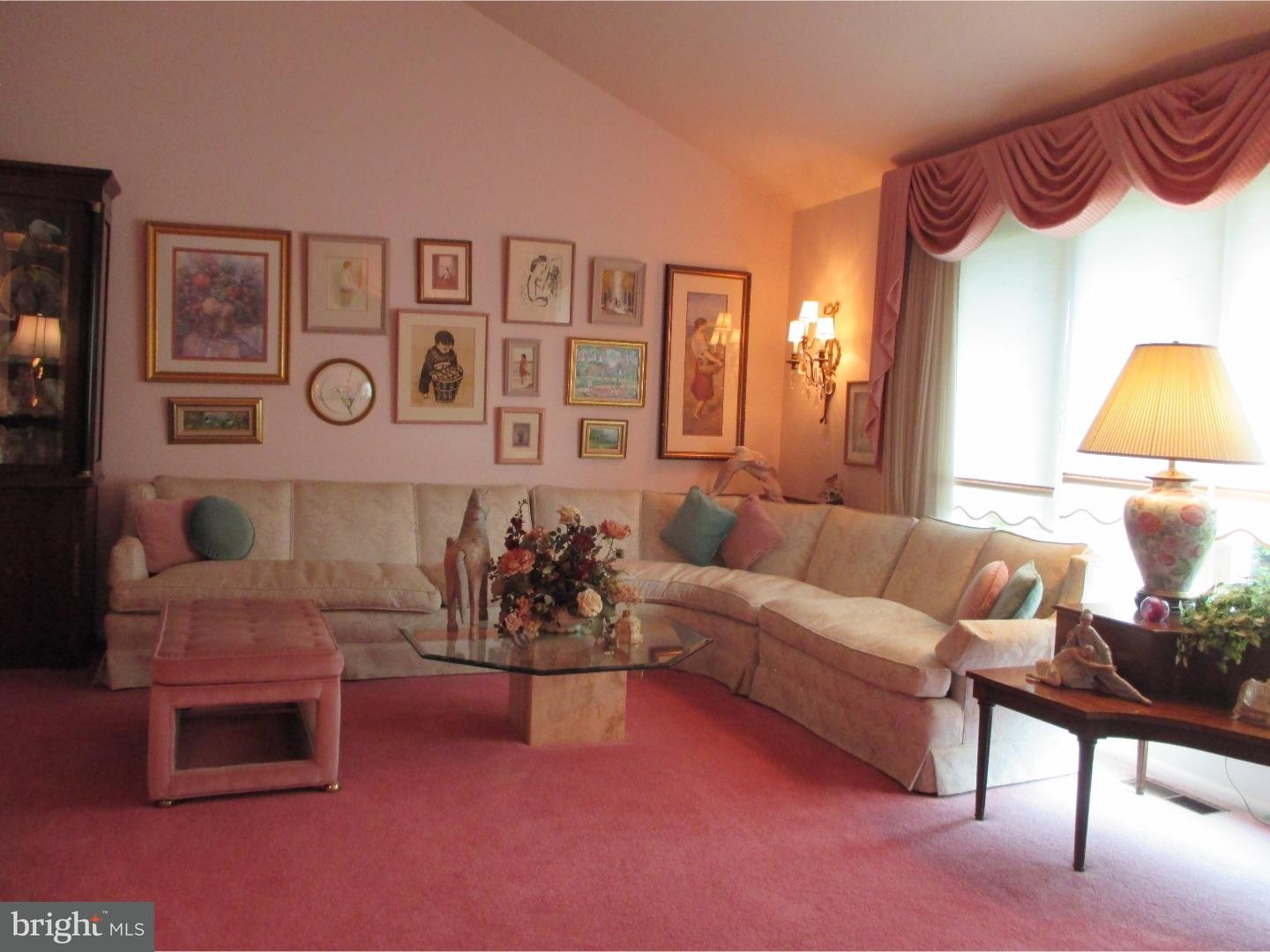 641 Kismet Road Philadelphia, PA 19115 - Photo 9 of 25 a living room with furniture and a lamp