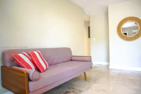 a living room with a couch and a table