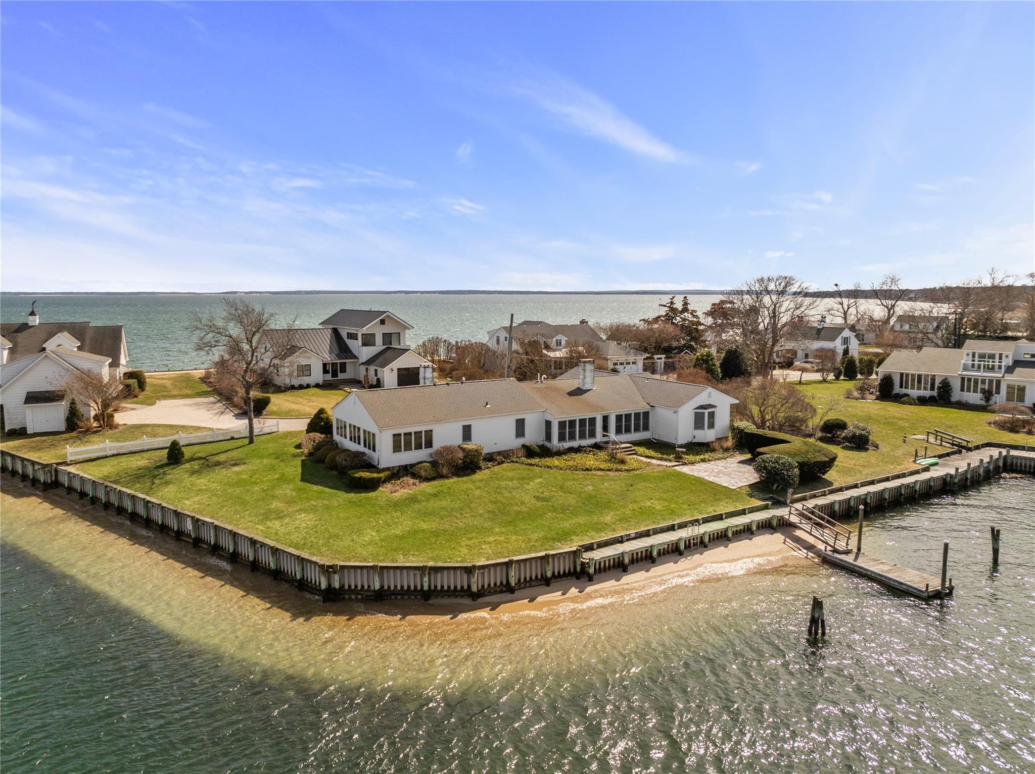 a view of a swimming pool with a yard