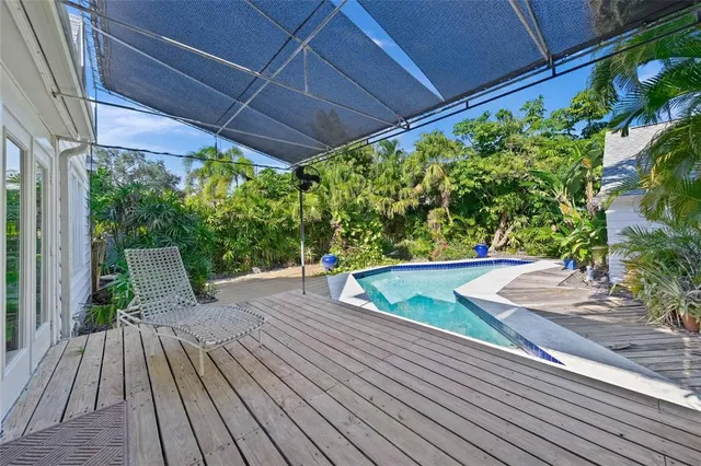 a view of outdoor space with wooden floor